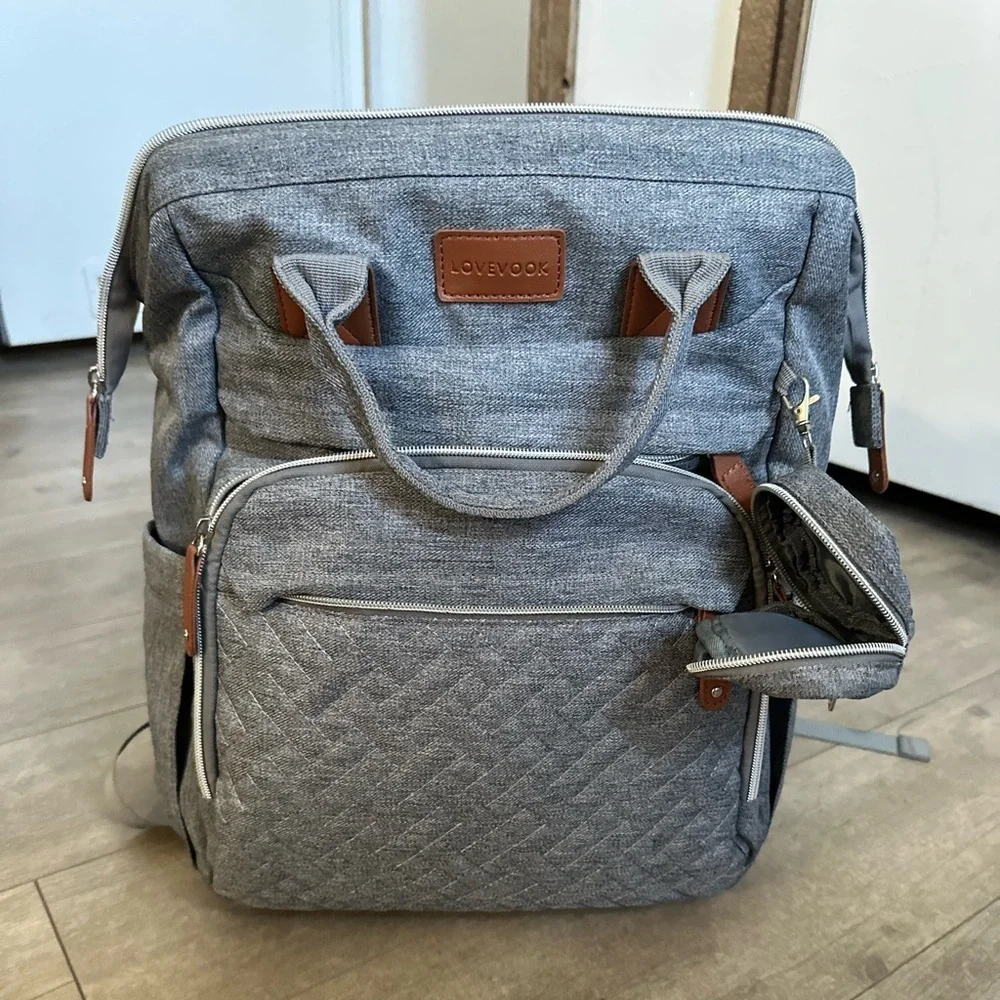 Boutique Large Diaper Bag, Backpack, Bassinet, Tech Charging Station all in one